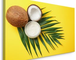 Schilderij - Kokosnoot en blad op gele achtergrond, Premium print